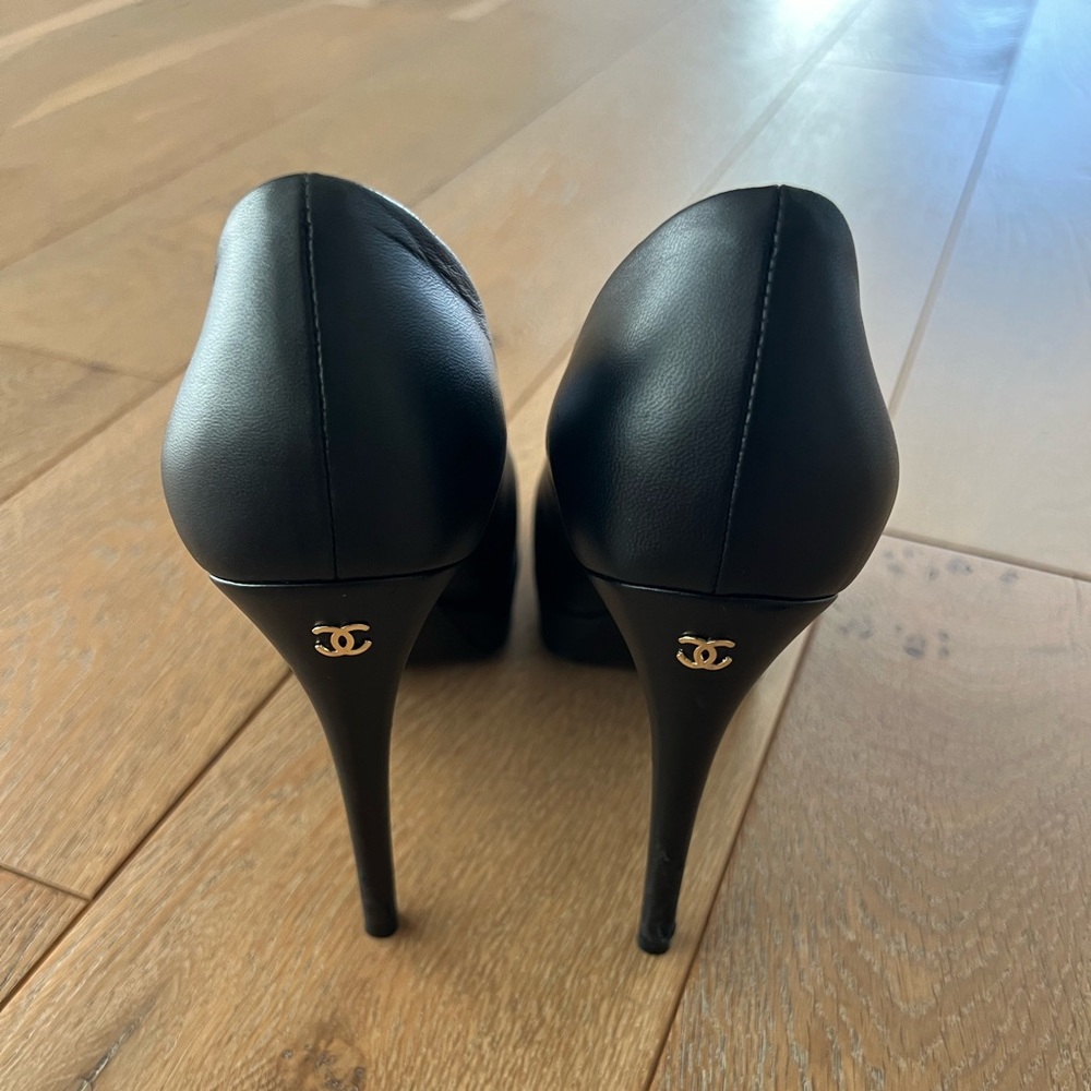 Authentic Chanel black platform heels size 8.